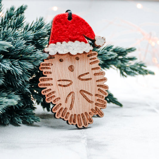 Wooden hedgehog Christmas tree decoration in felt Santa hat