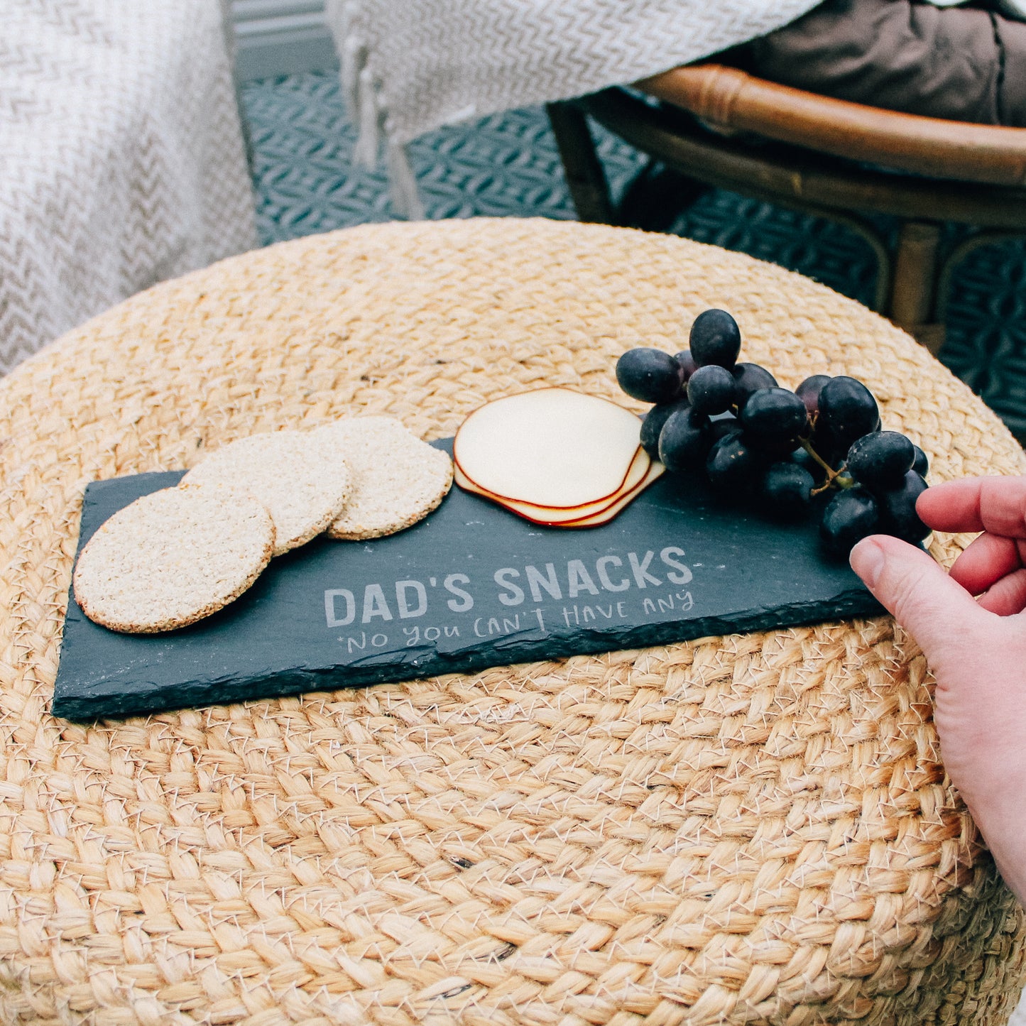 Engraved slate serving board featuring a playful inscription "Dad's Snacks No You Can't Have Any" - a fun way for Dad to showcase his cheese collection (with a clear warning!).