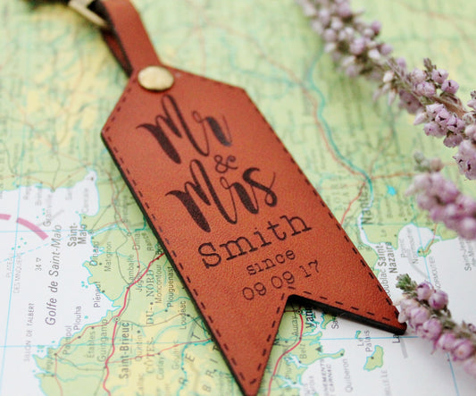 Personalised luggage tag for 3 year leather anniversary gift. Ideal for travelling couple