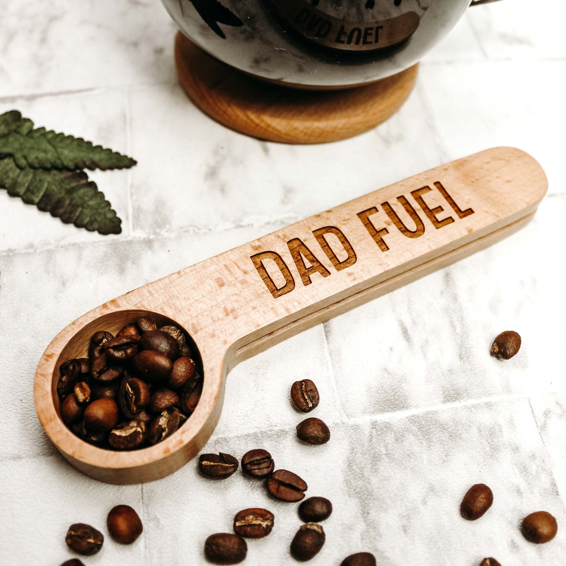 Wooden coffee scoop and clip engraved with the phrase dad fuel