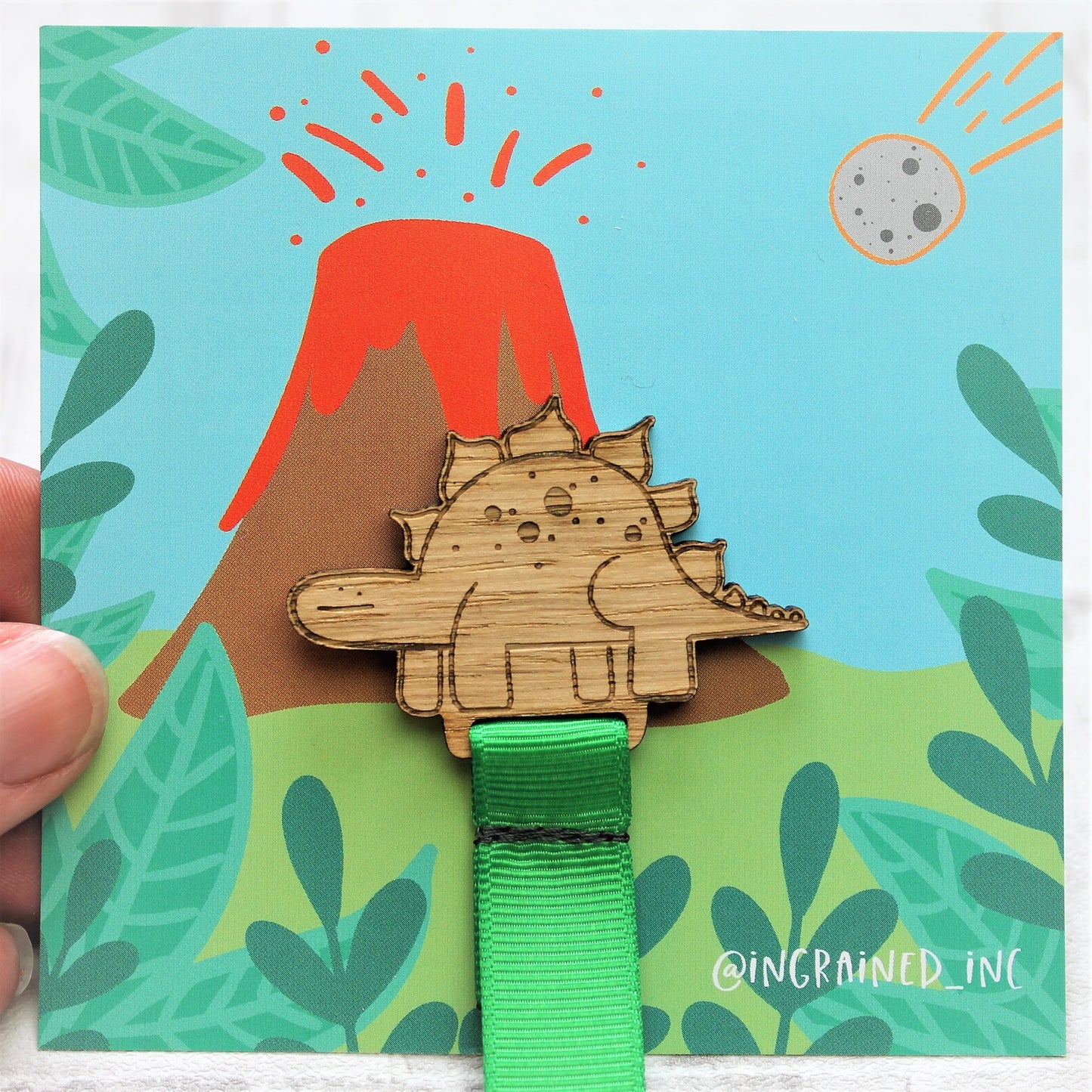 wooden dinosaur bookmark for child with green ribbon 