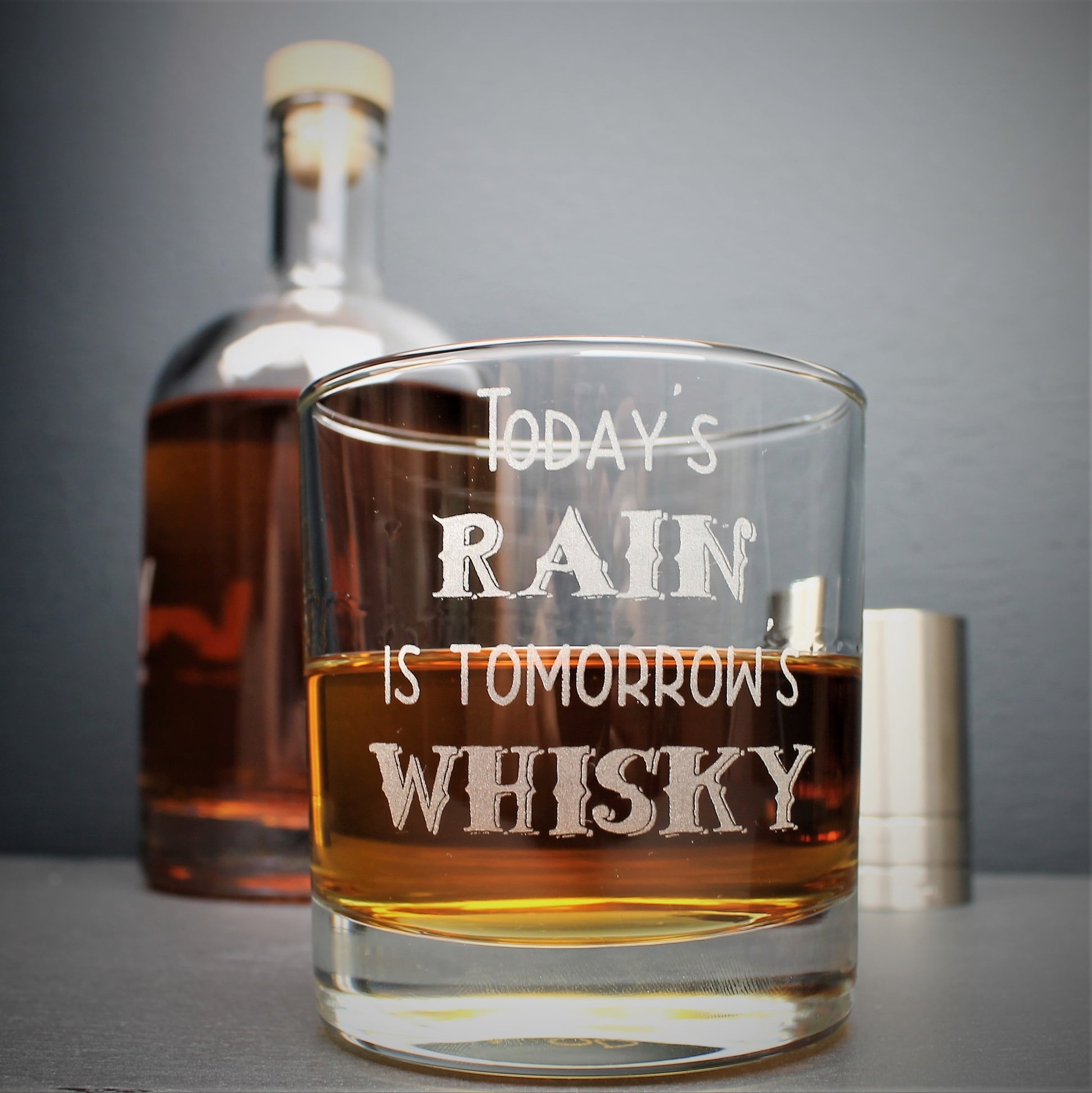 Engraved whisky glass etched with the Scottish quote, todays rain is tomorrows whisky