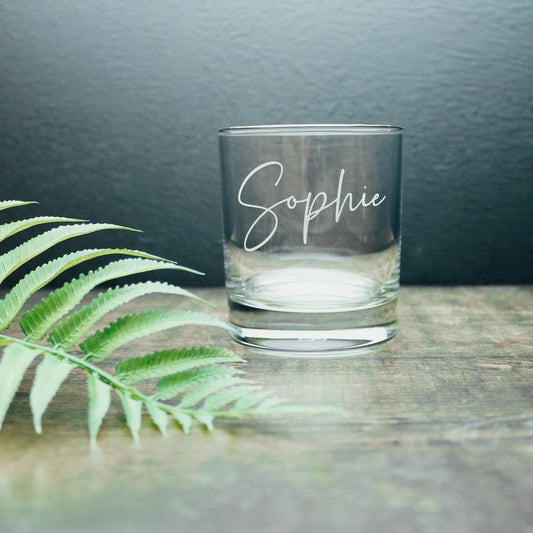 Glass tumbler engraved in white with a personalised name in a calligraphy handwriting style font