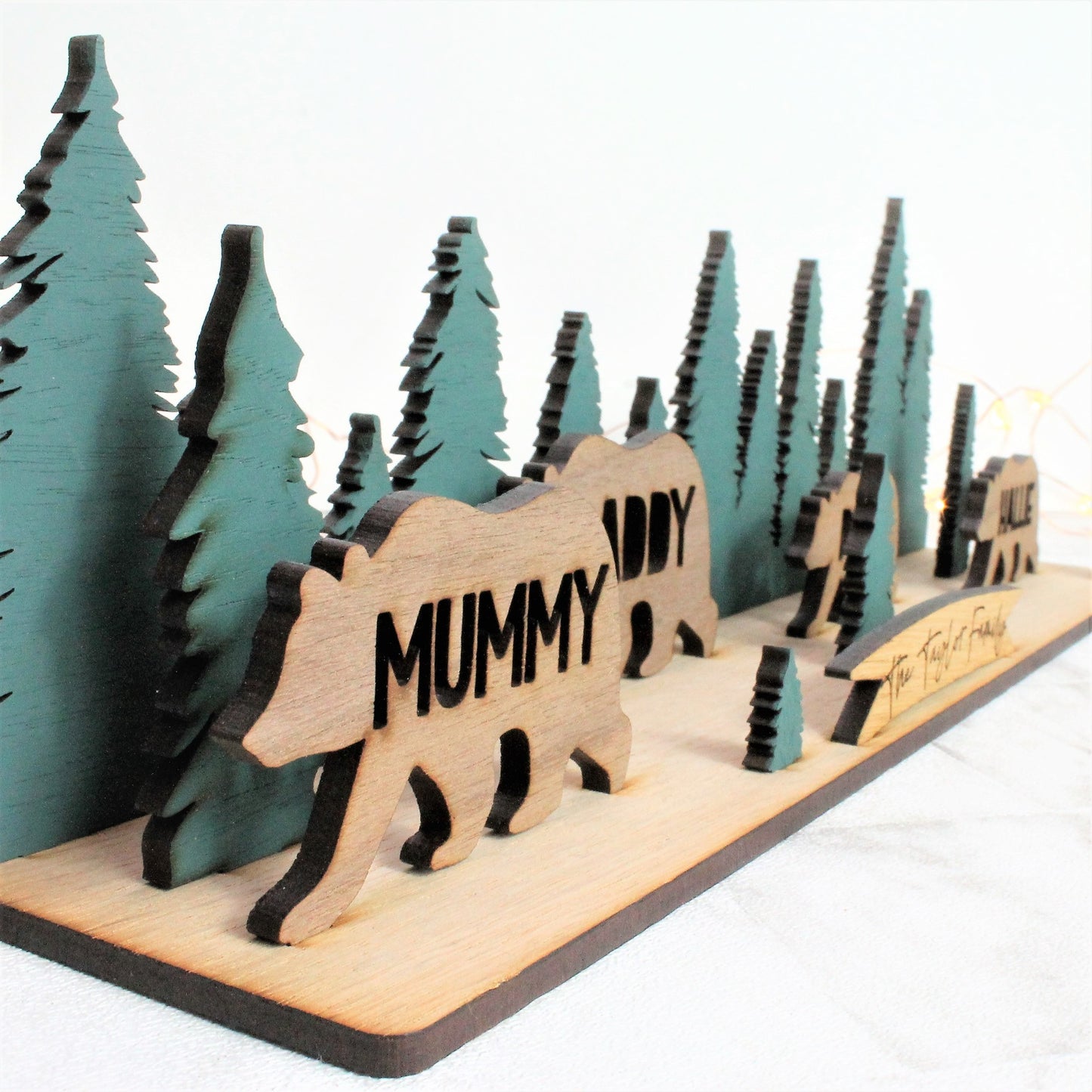 side view of wooden 3d family bear sign