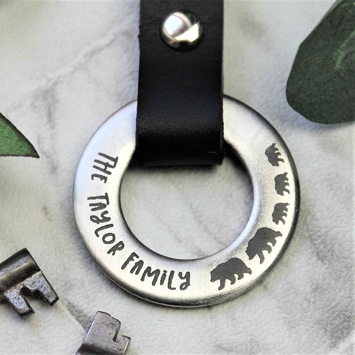 Steel metal keyring with personalised family surname and bear family design
