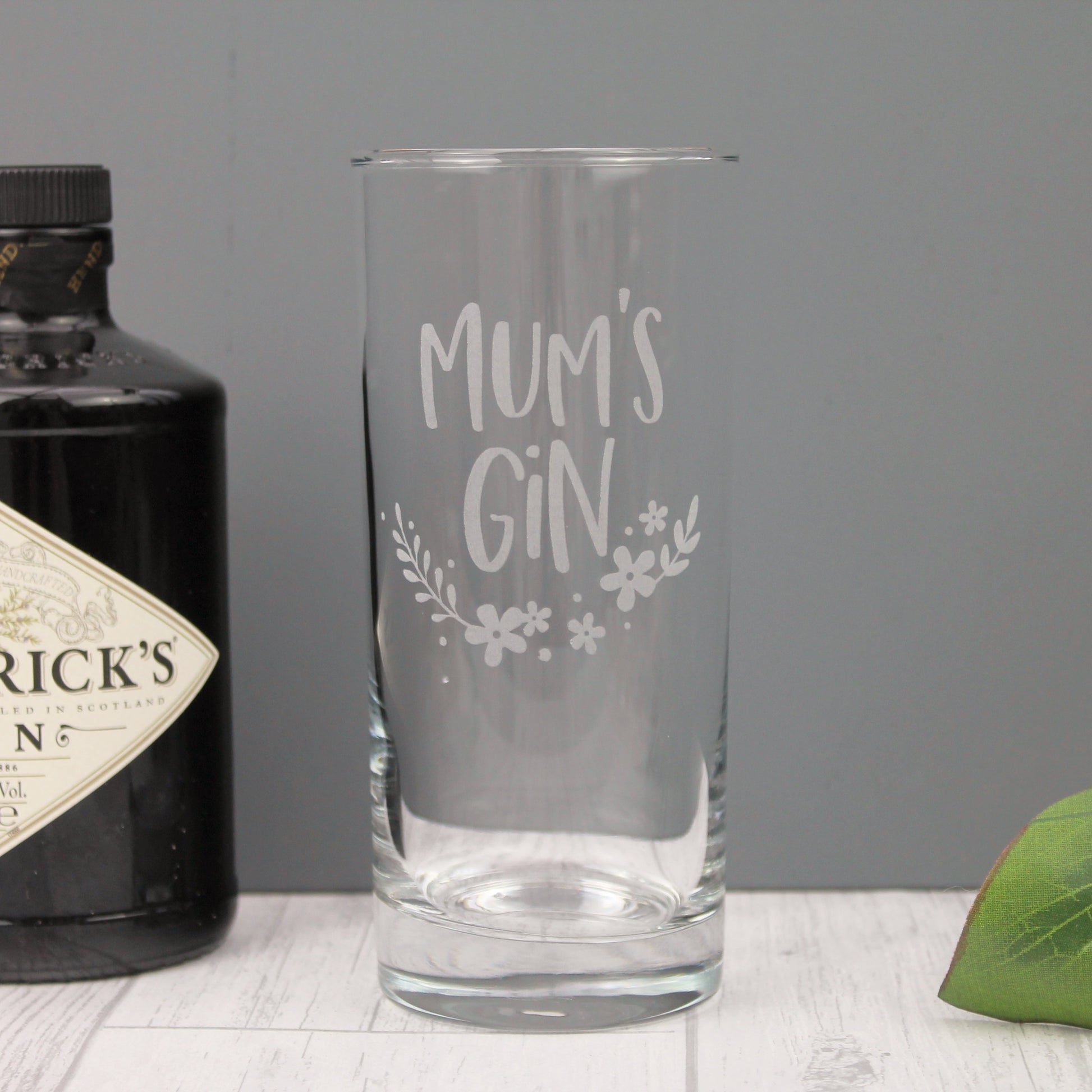 Contemporary engraved gin glass with words mums gin and flower design
