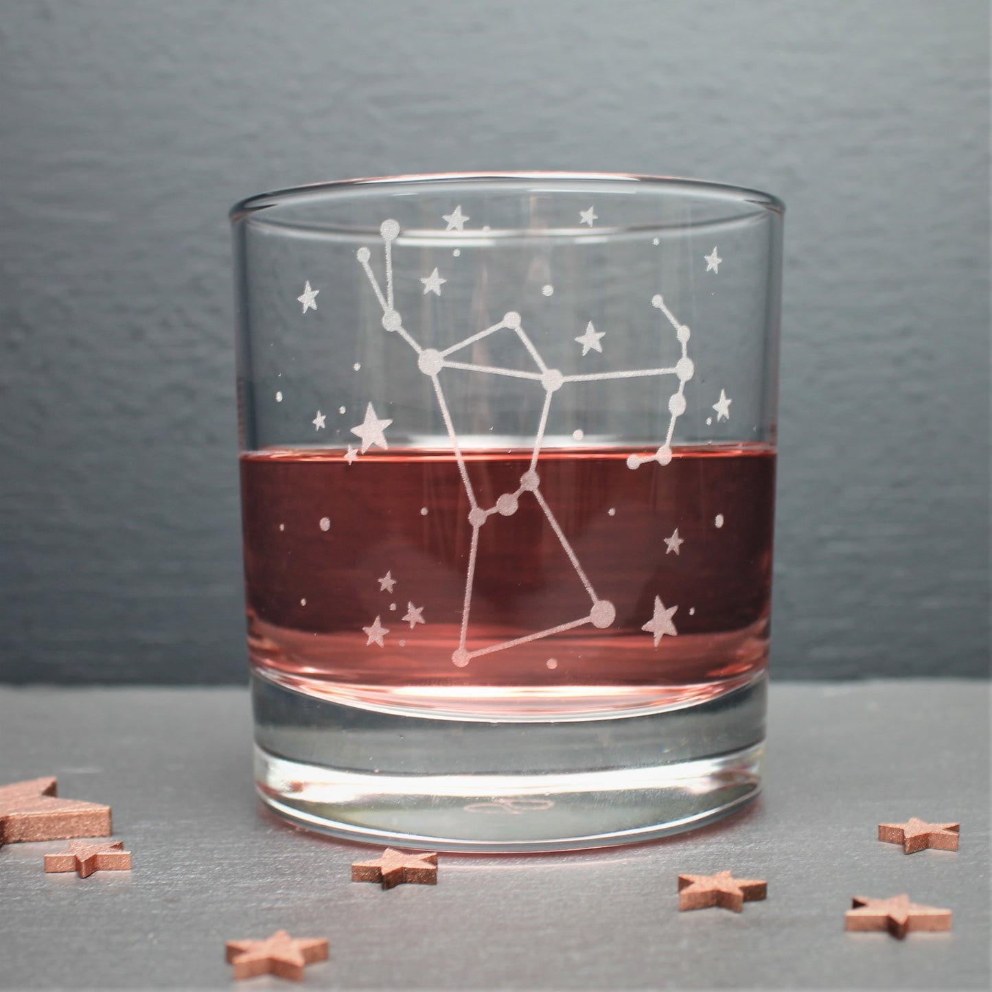 Glass tumbler engraved with the Orion constellation and star design