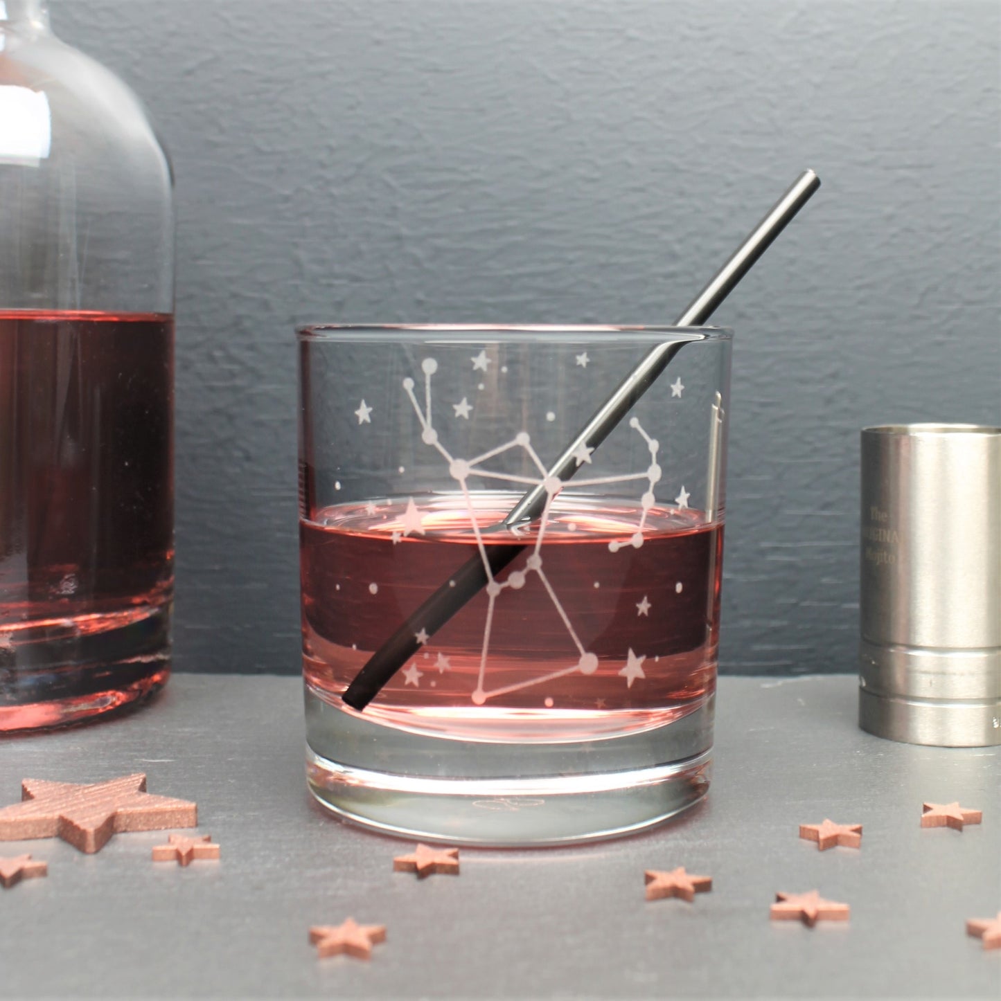 Glass tumbler engraved with the Orion constellation and star design