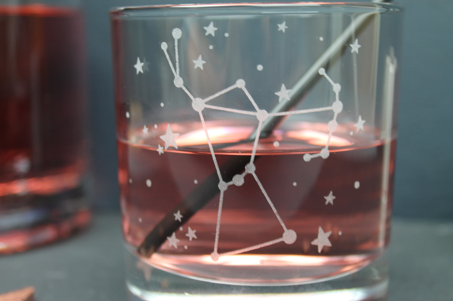 Glass tumbler engraved with the Orion constellation and star design