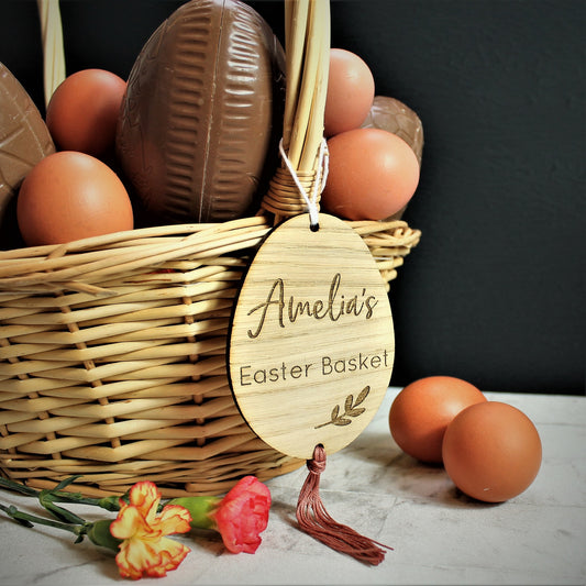 wooden engraved egg shaped tag for easter basket. Personalised with name
