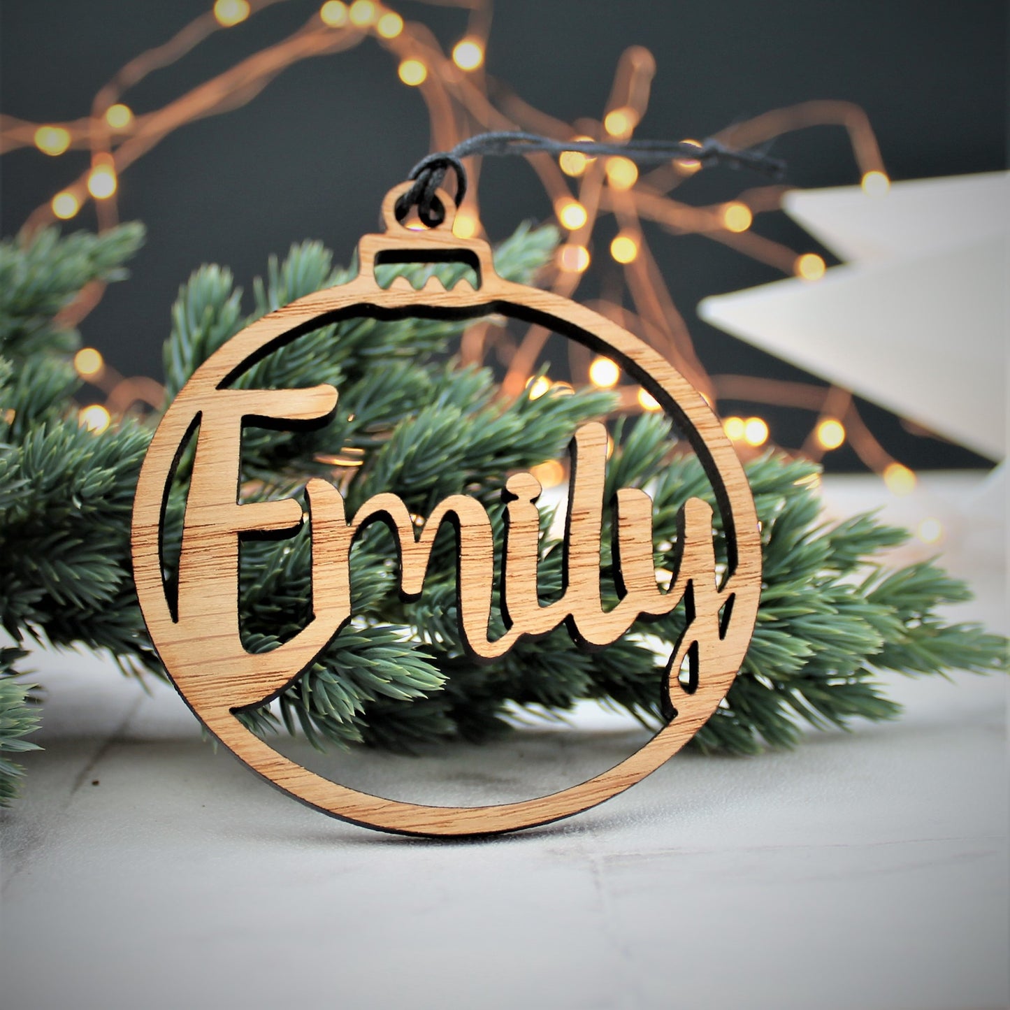 Personalised Christmas ornament with cut out name. Perfect for decorating the Christmas Tree