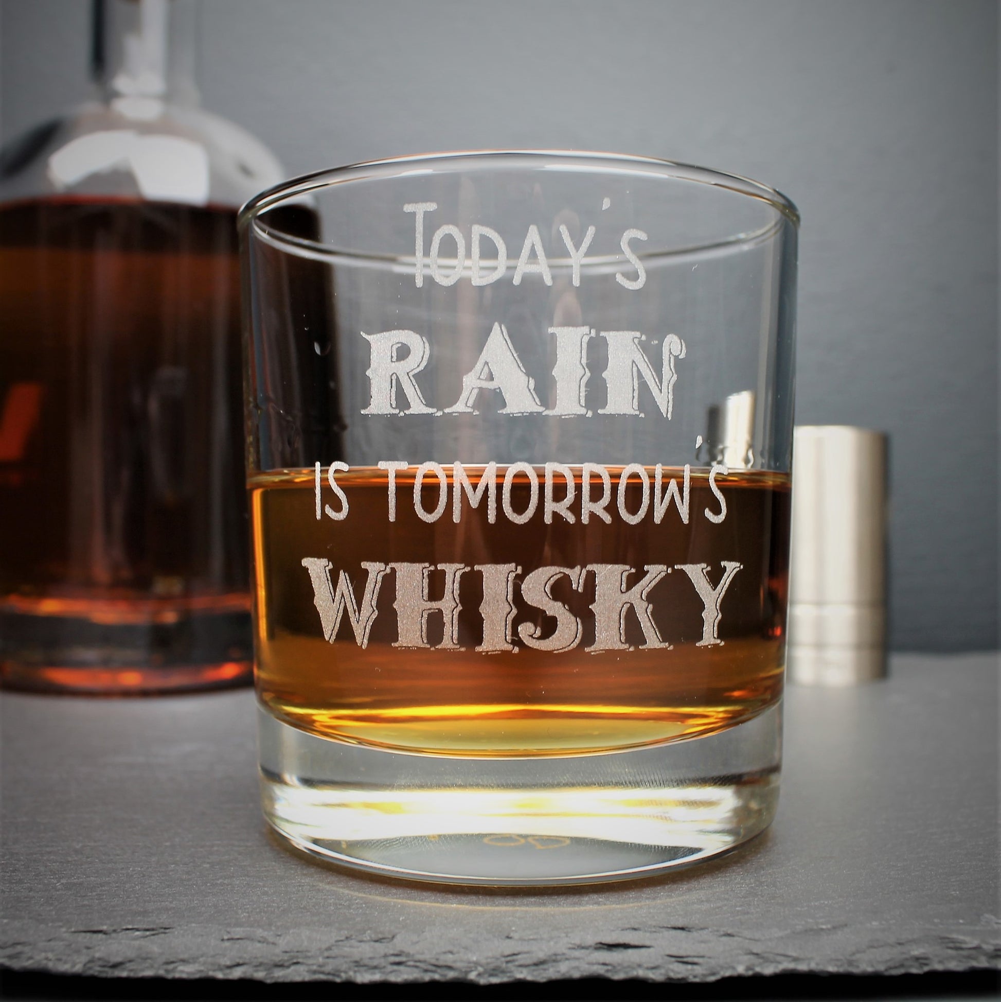 Engraved whisky glass etched with the Scottish quote, todays rain is tomorrows whisky