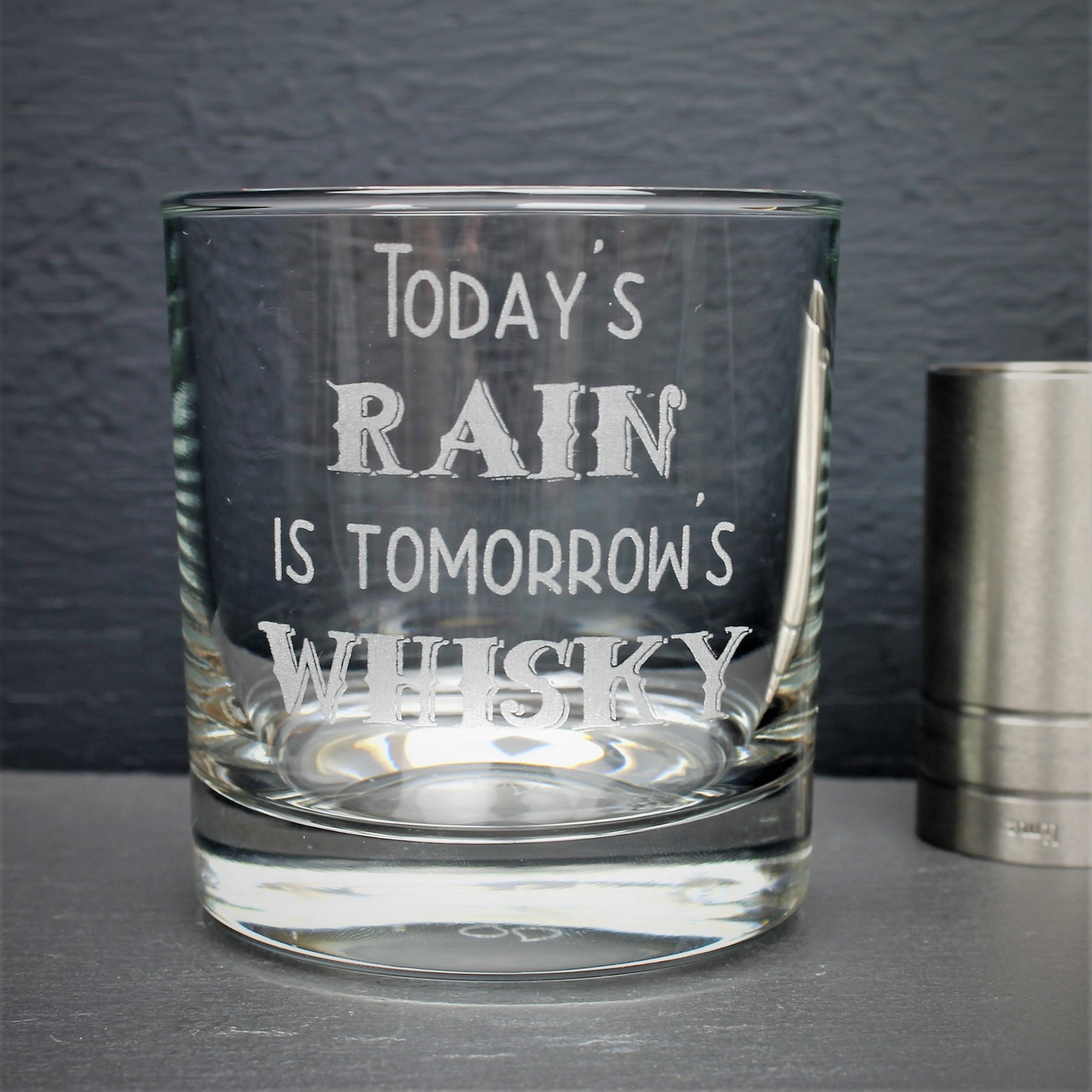 Engraved whisky glass etched with the Scottish quote, todays rain is tomorrows whisky