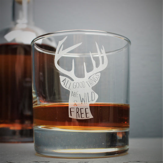 Engraved whisky tumbler glass with stag design and quote