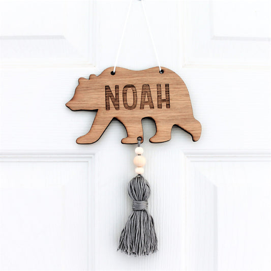 wooden engraved bear with personalised name and coloured tassel