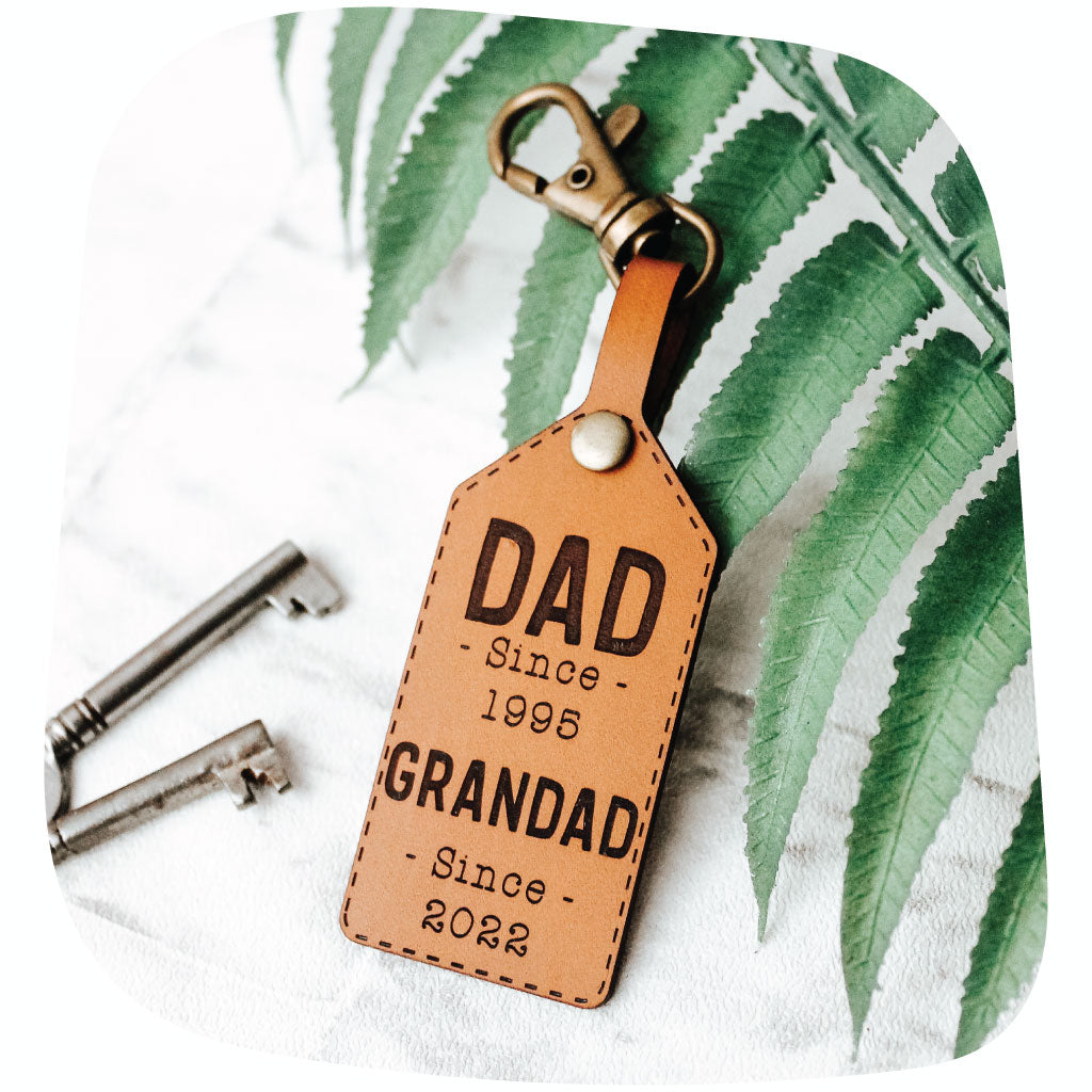 Personalised leather keyring engraved with custom text on natural leather made in UK