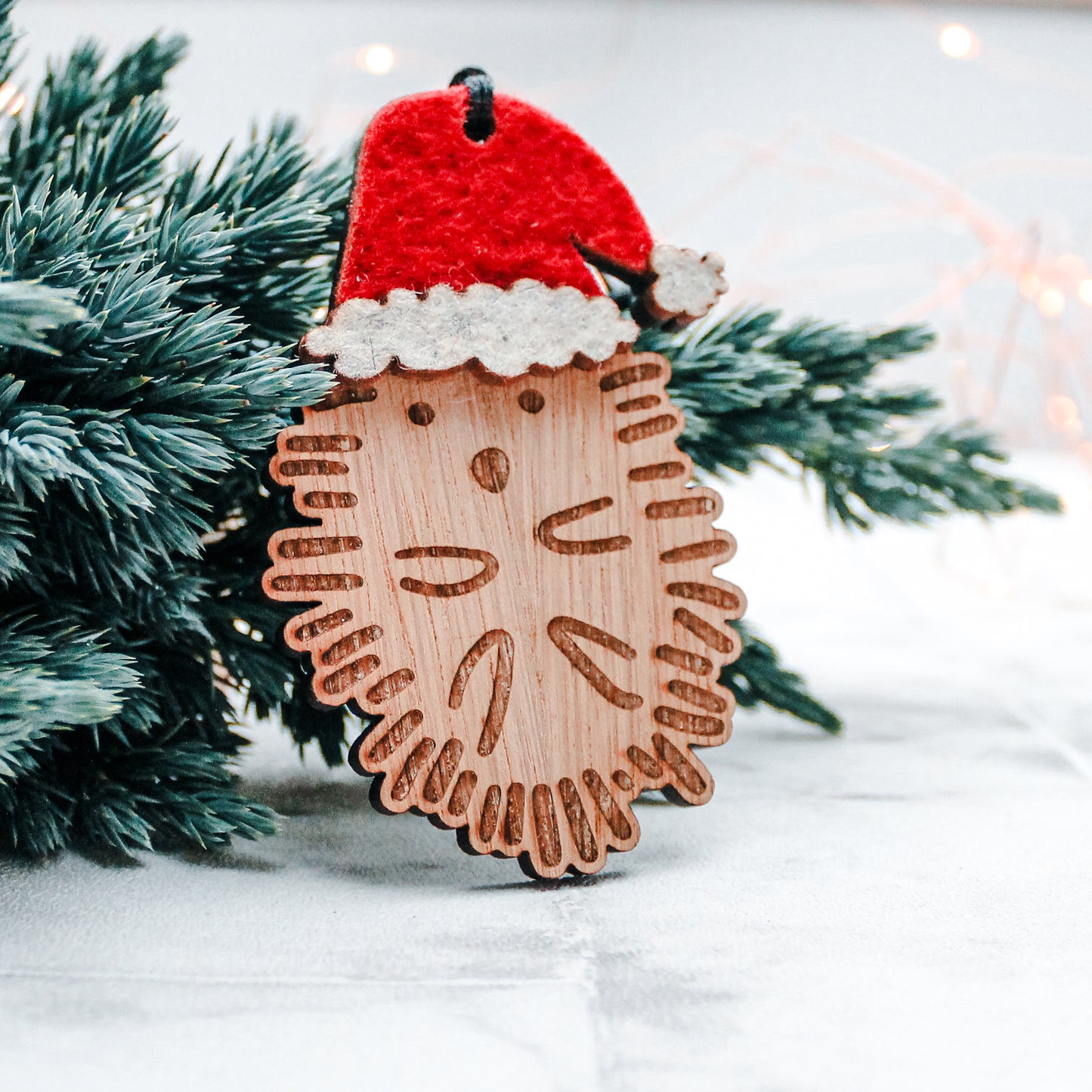 Wooden hedgehog Christmas tree decoration in felt Santa hat 