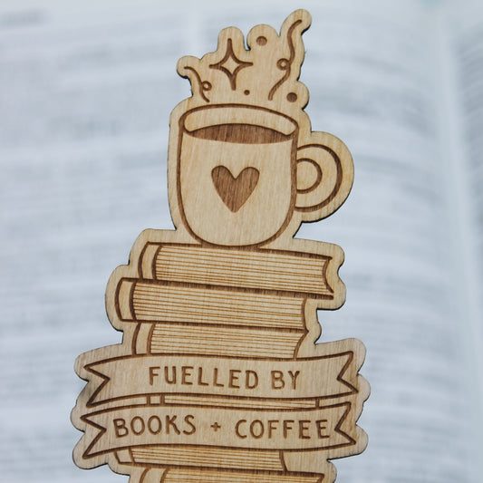 Wooden bookmark with a design of a coffee cup, books, and 'Fuelled by Books + Coffee' text.