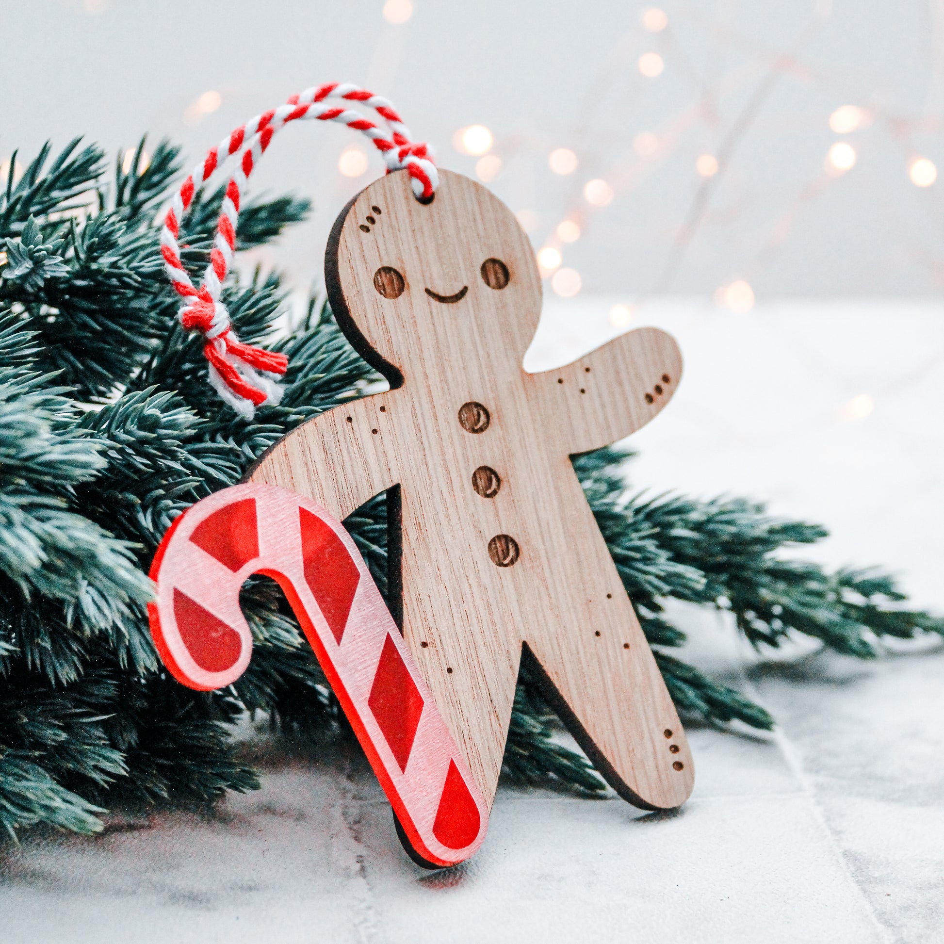 wooden cute Gingerbread man Christmas tree decoration with candy cane stick