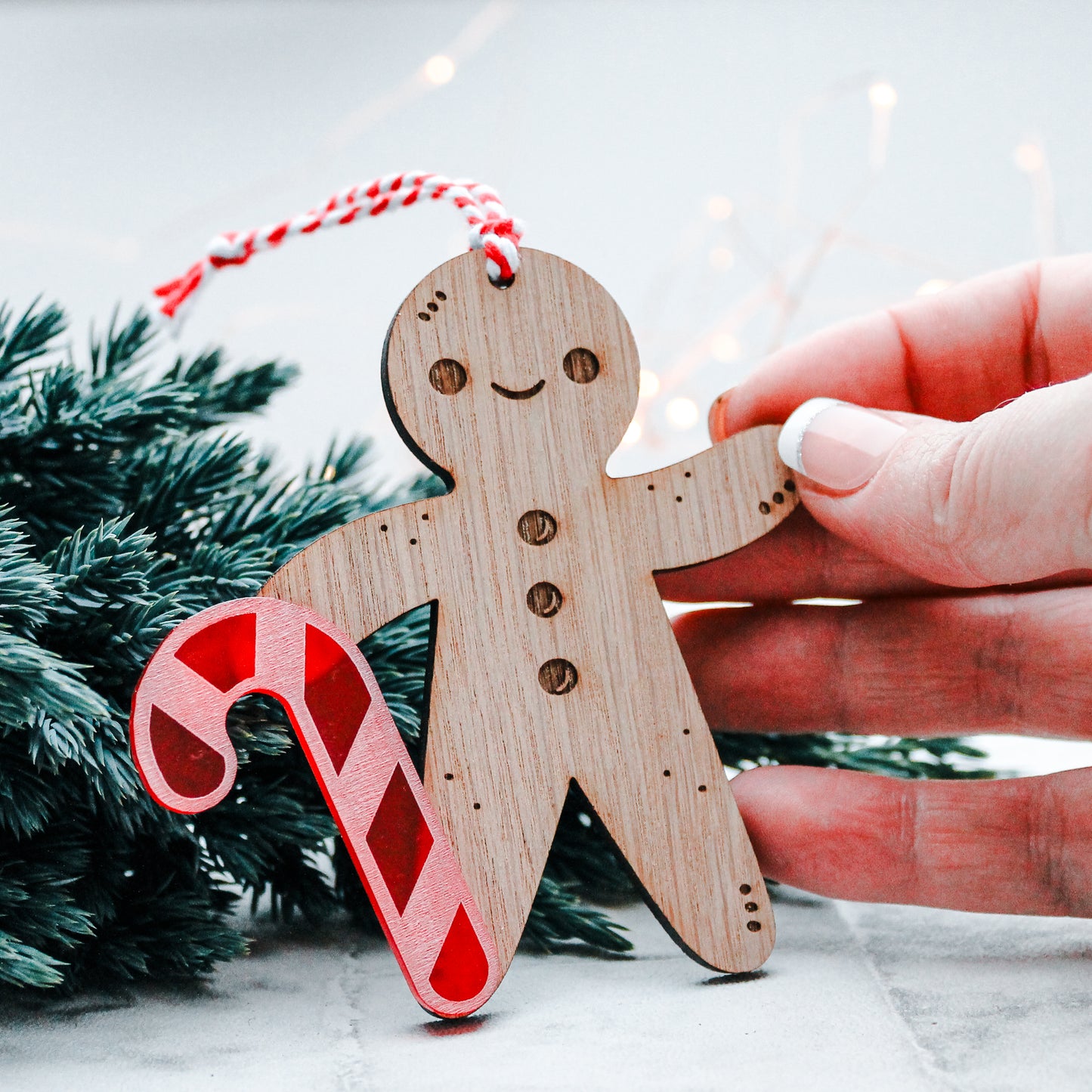 wooden Gingerbread man Christmas tree decoration with candy cane stick 