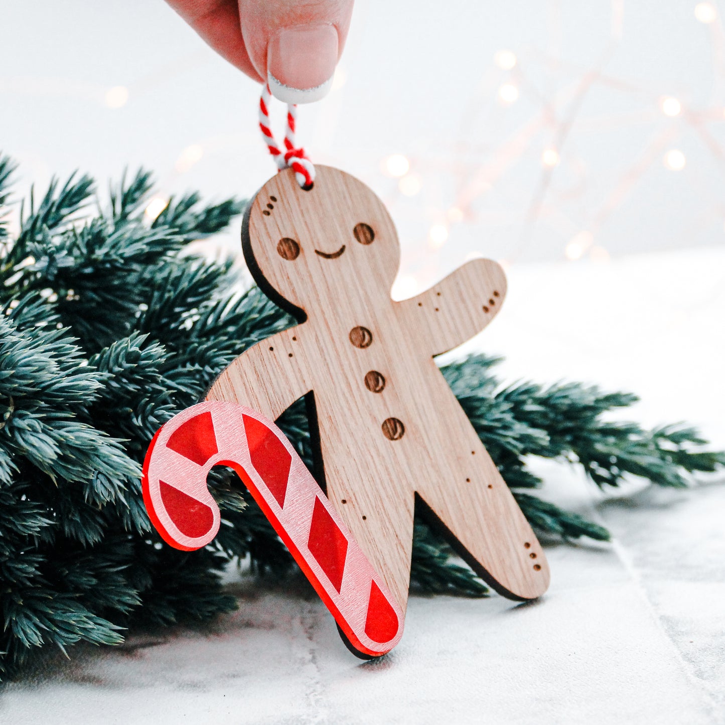 wooden kawaii Gingerbread man Christmas tree decoration with candy cane stick