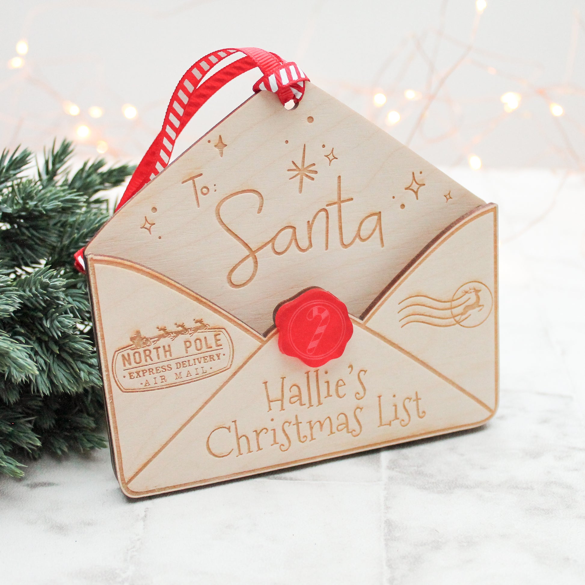 wooden envelope personalised with a name for putting in your letter to santa and hanging it up on the Christmas tree 