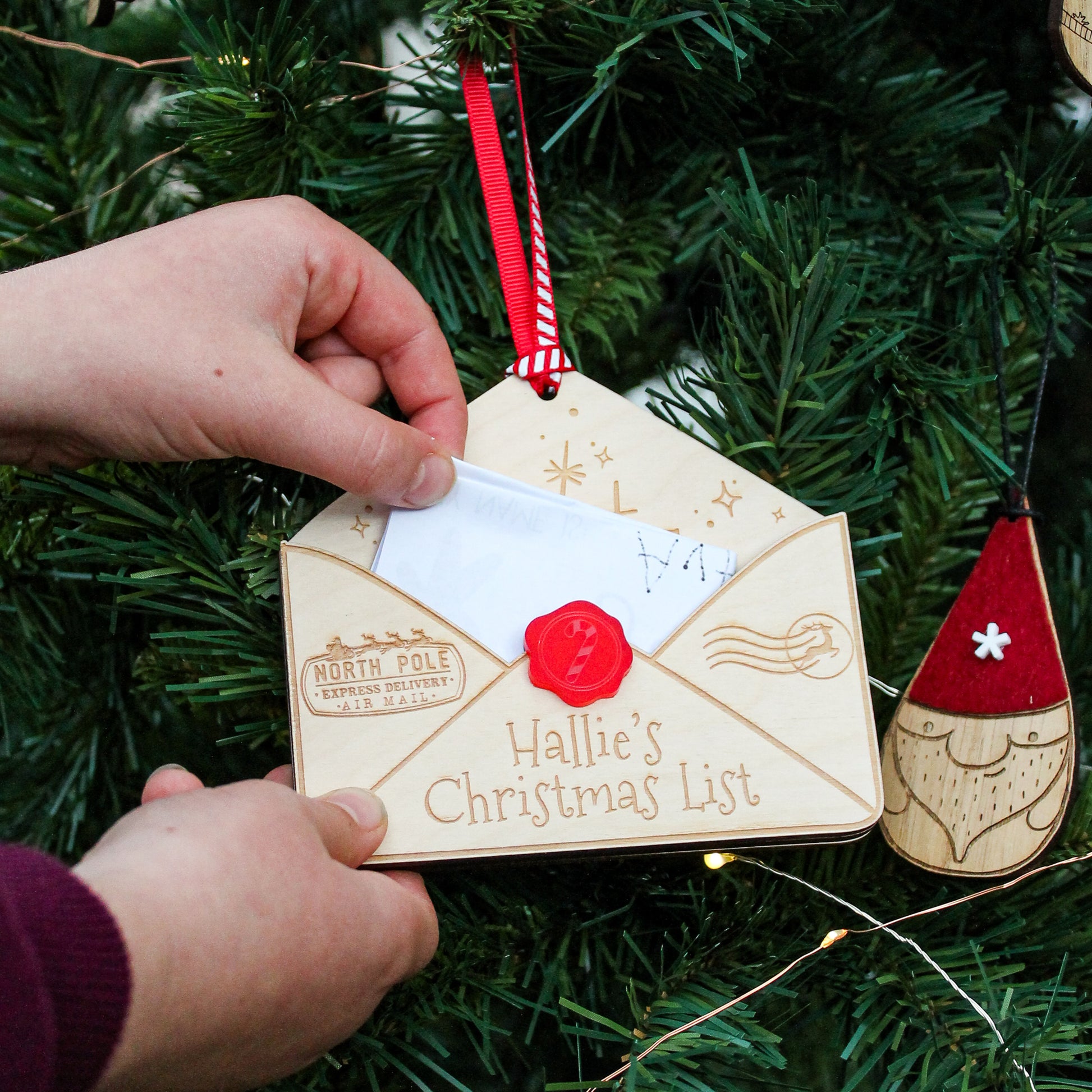 wooden envelope personalised with a name for putting in your letter to santa and hanging it up on the Christmas tree 