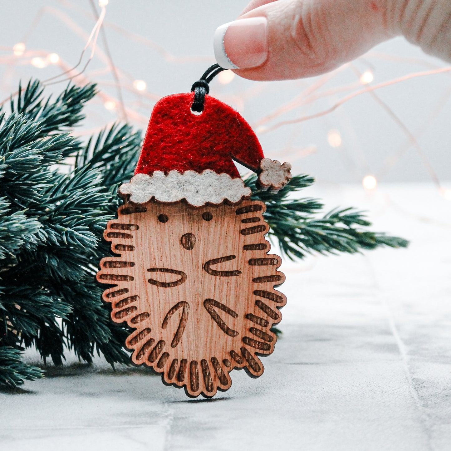 Wooden hedgehog Christmas tree decoration in felt Santa hat 