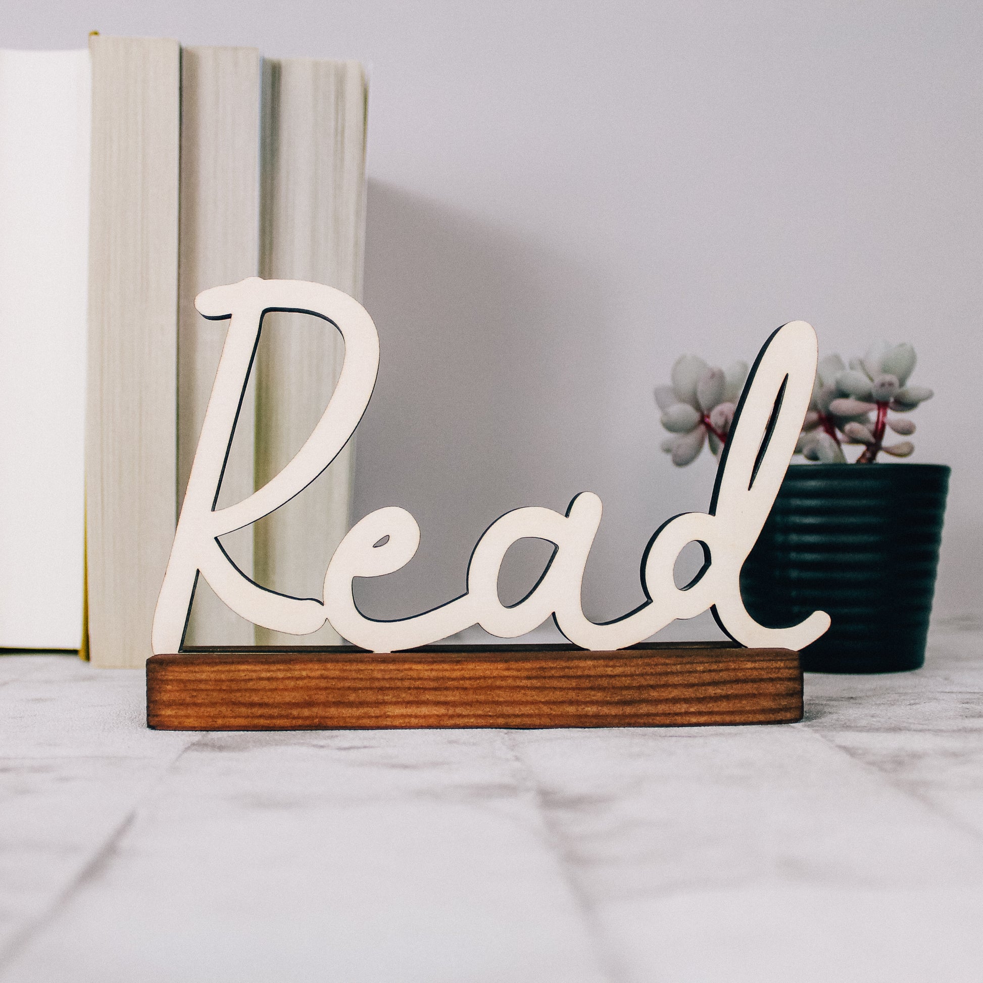 bookcase decor - read word sign made from wood 