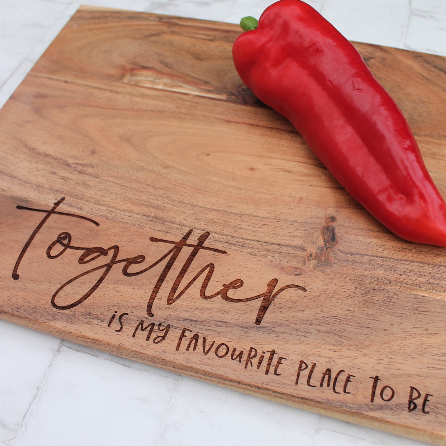 Wooden chopping board engraved with the quote together is my favourite place to be
