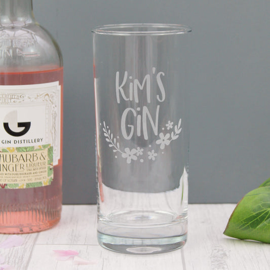 Tall gin glass engraved with the personalised text of your choice, with added floral design elements 