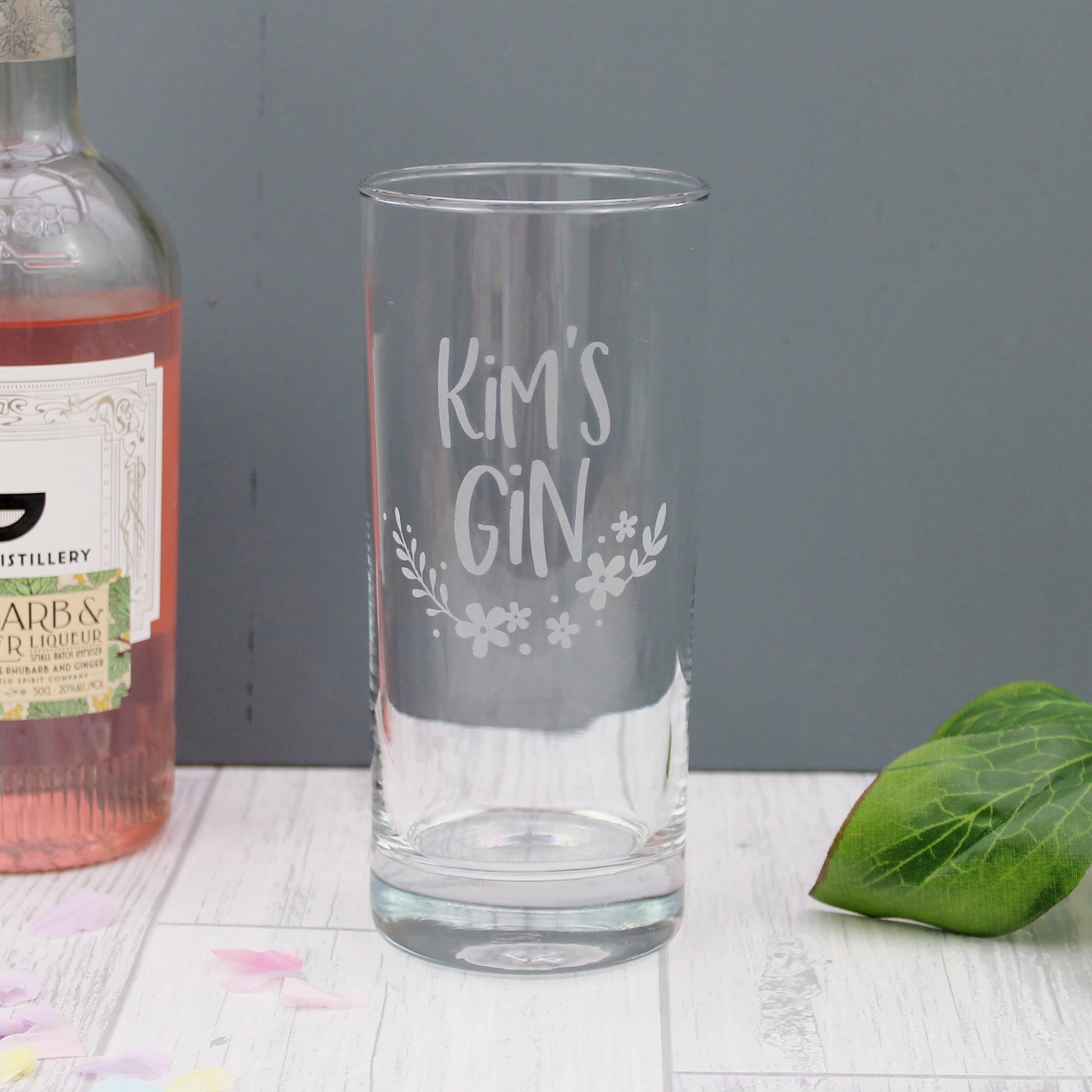 custom gin lover glass, engraved with the name of choice with a floral design underneath 