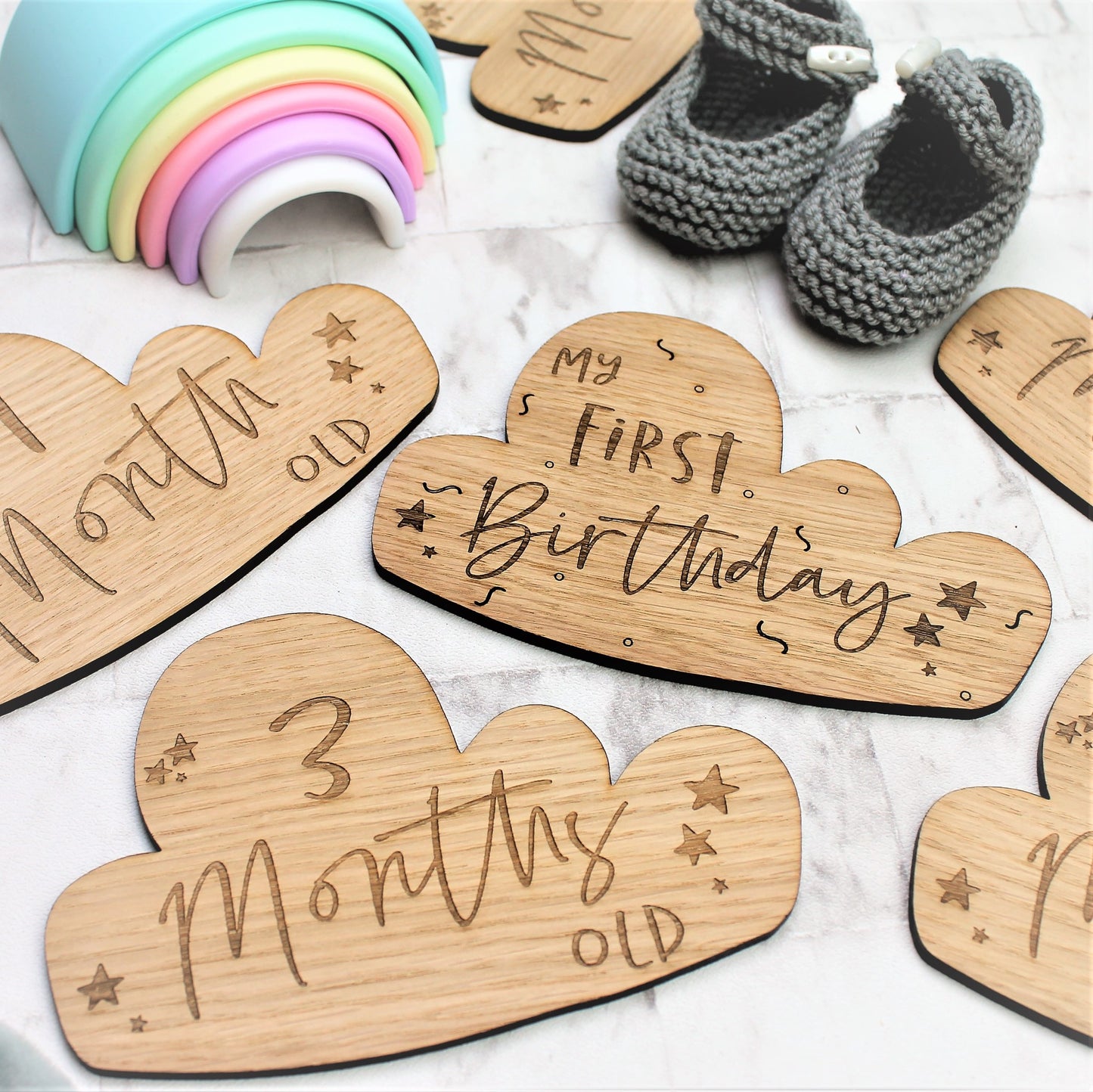 wooden cloud shape engraved baby milestone cards, engraved with first months, first birthday and moments
