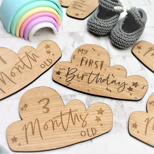 wooden cloud shape engraved baby milestone cards, engraved with first months, first birthday and moments
