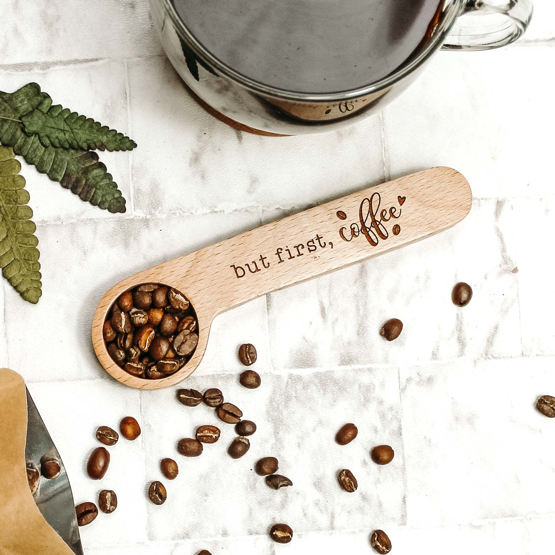 wooden coffee lovers spoon for morning coffees engraved with the words, but first coffee