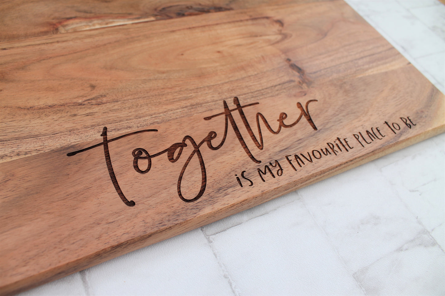 Wooden chopping board for mothers day, engraved with the phrase together is my favourite place to be 