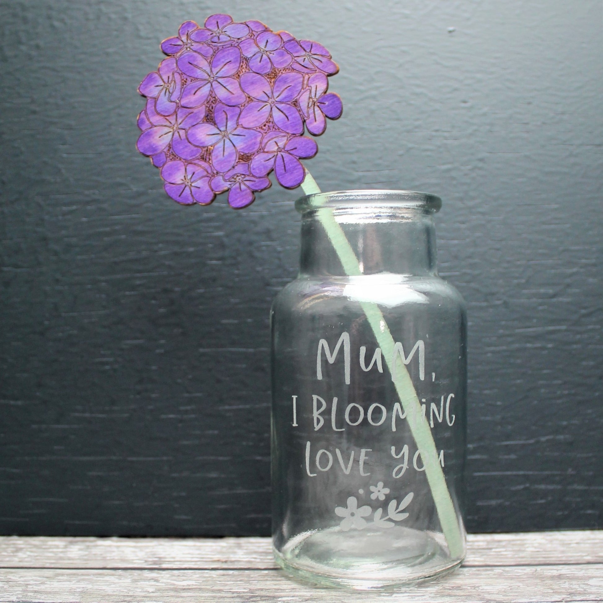 wooden hand painted flower in an engraved vase for mothers day