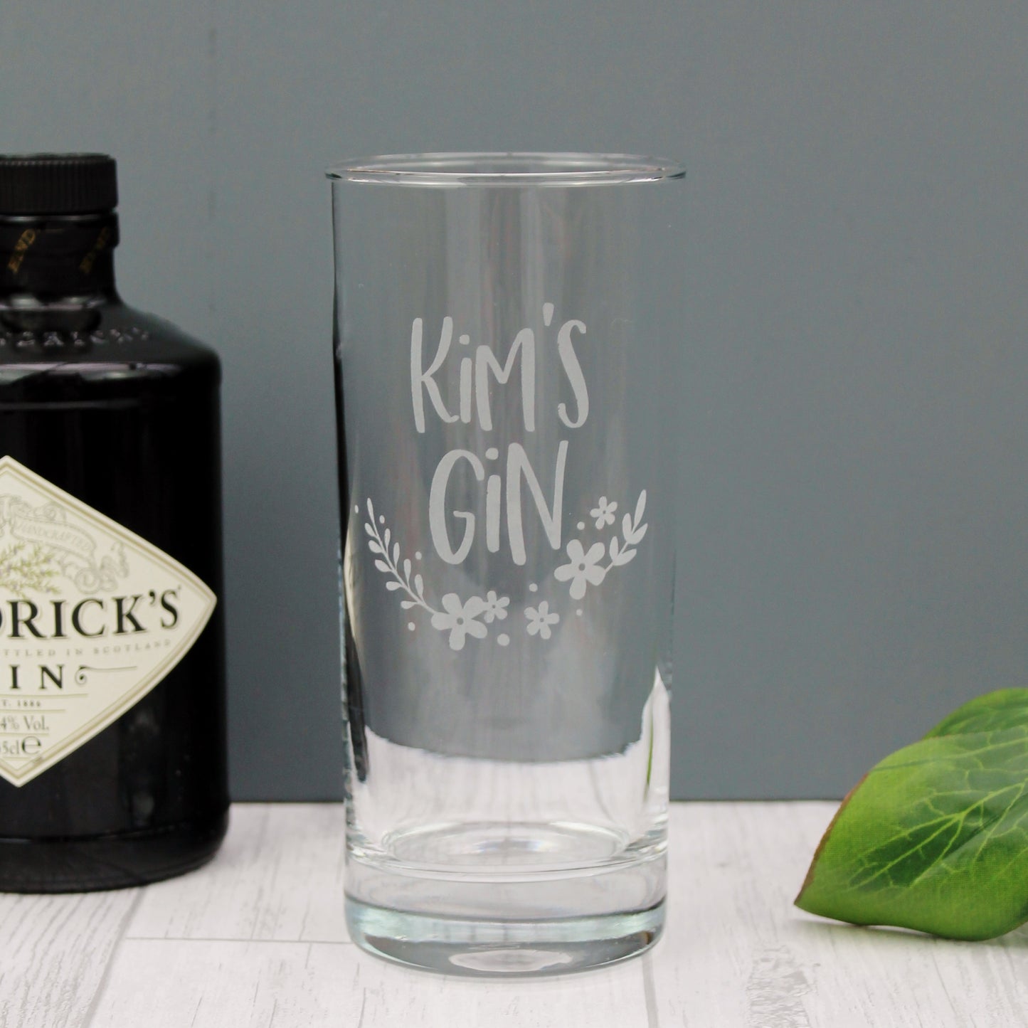 personalised gin glass engraved with the name of your choice with flower design