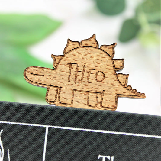 wooden engraved personalised name dinosaur bookmark with green ribbon