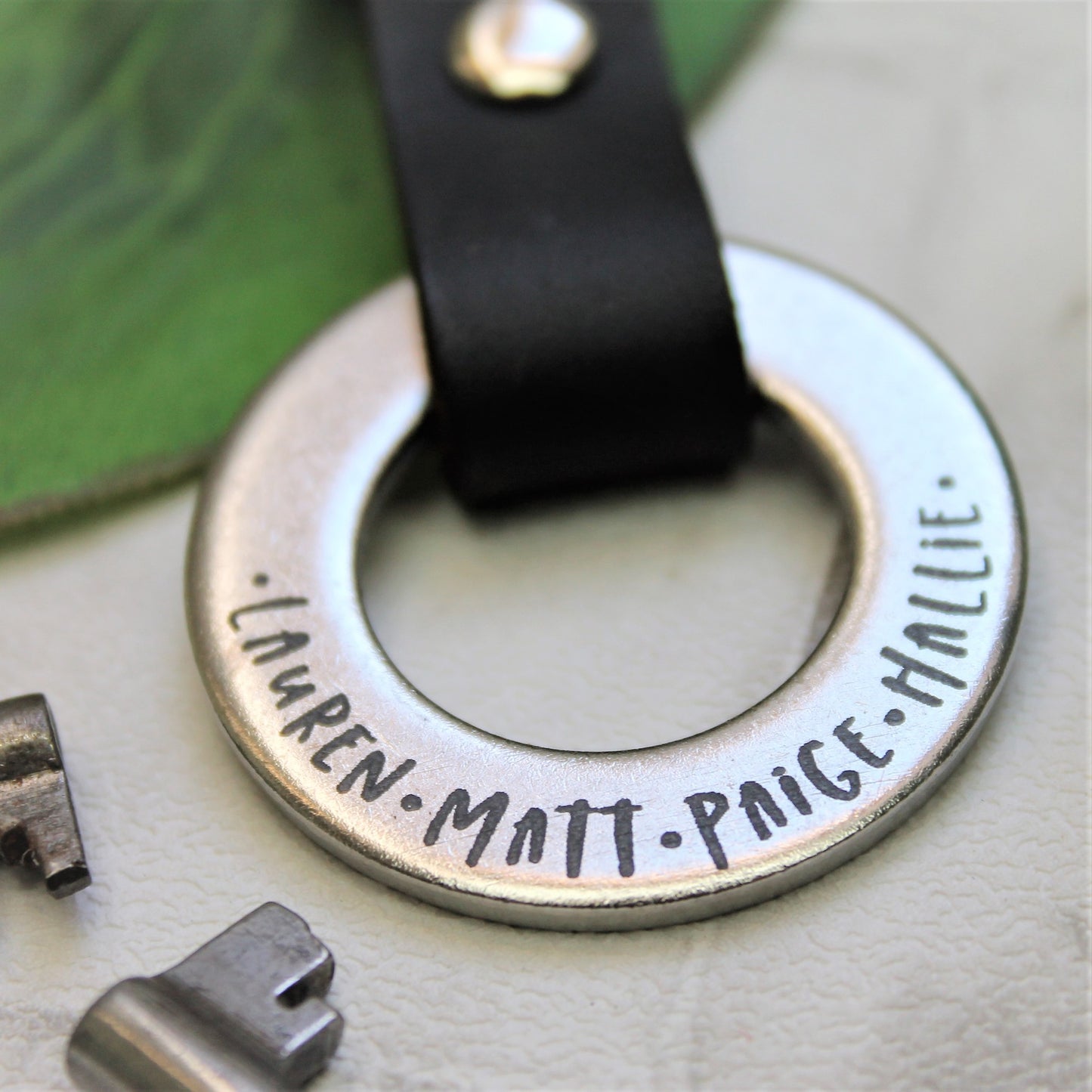Steel and leather keyring with personalised family names gift for dad