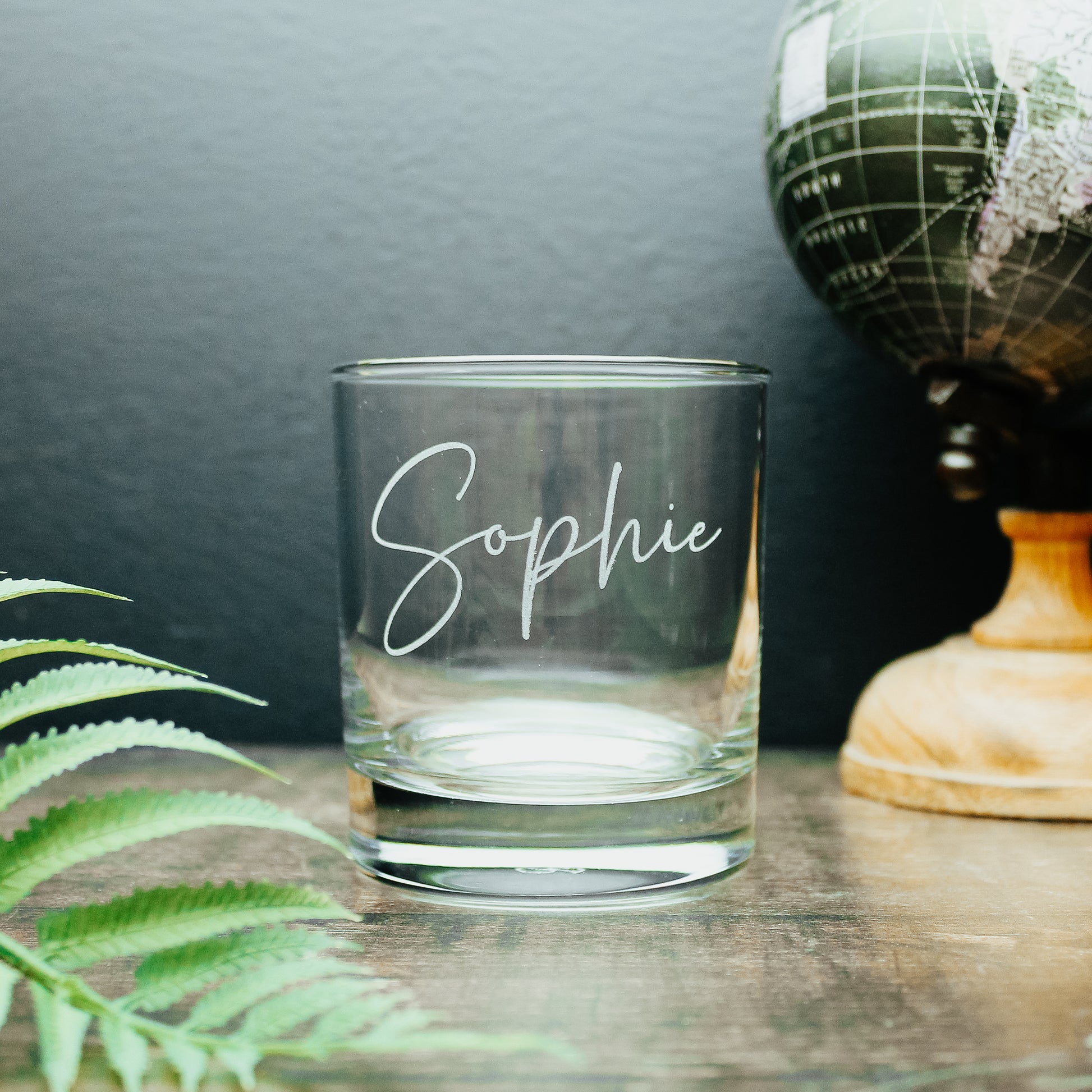 Glass tumbler engraved with a personalised name in a calligraphy handwriting style font. Ideal birthday gift