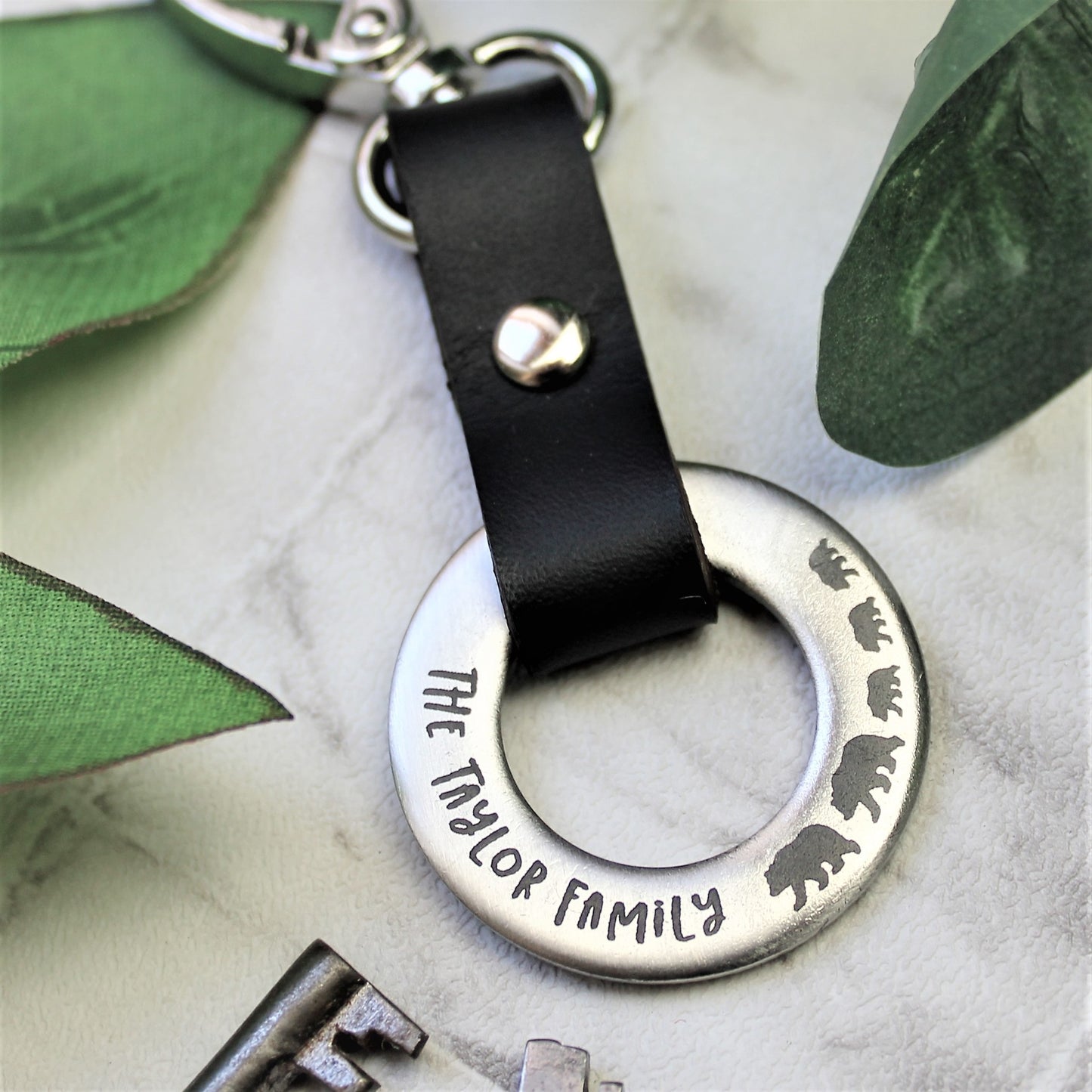 steel and leather personalised keyring  with family name and bear - fathers day gift