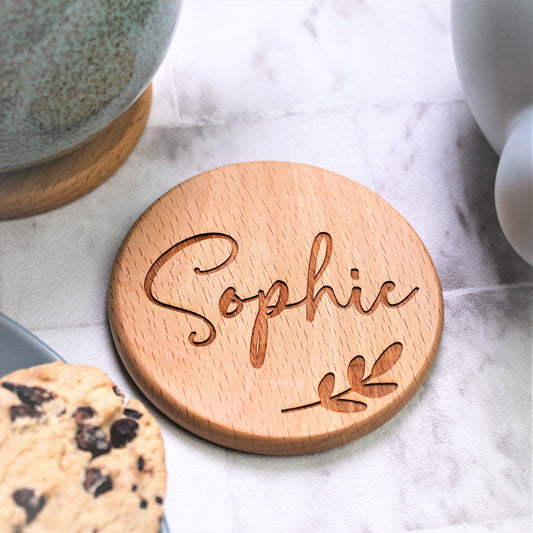 round wooden coaster with personalised name engraved