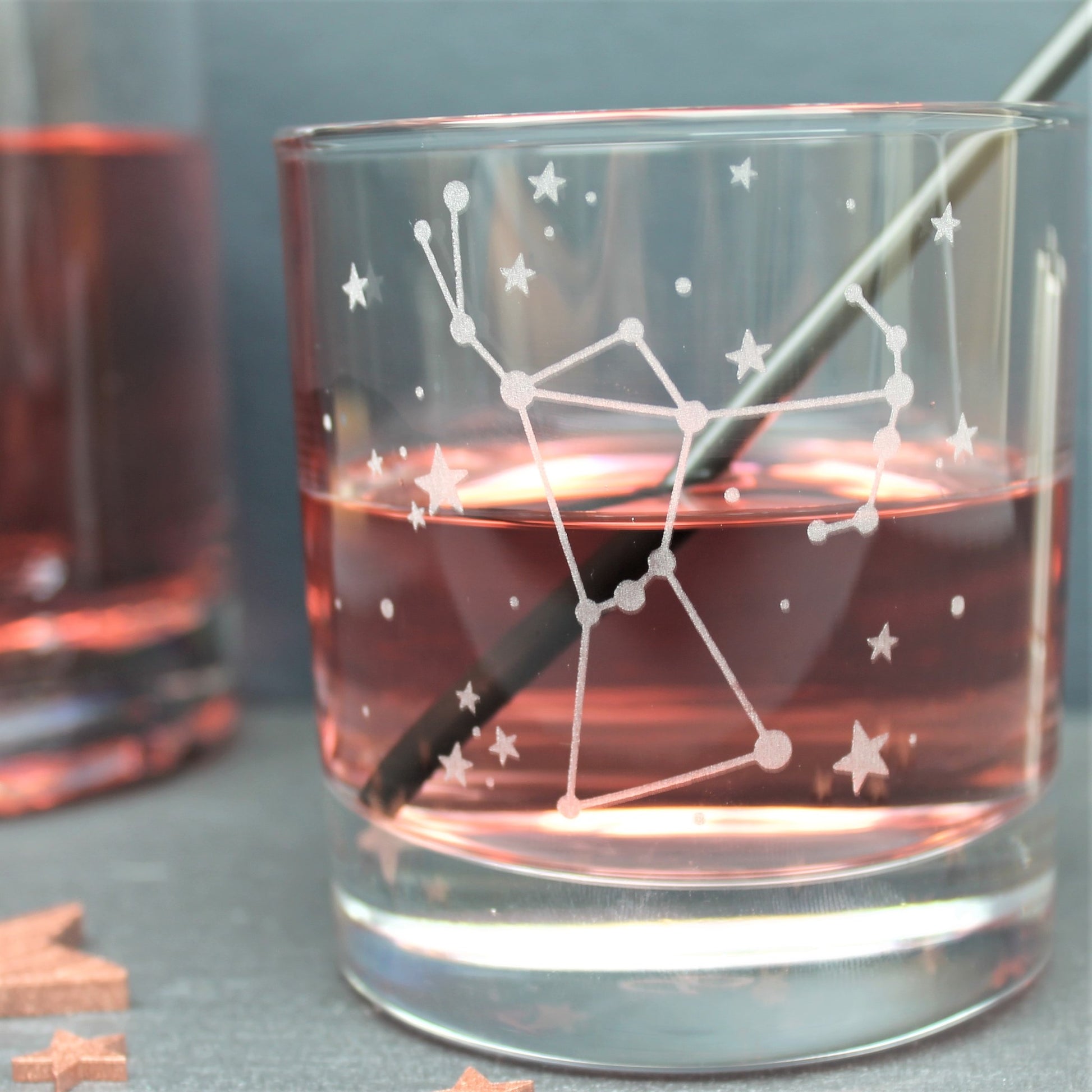 Glass tumbler engraved with the Orion constellation and star design