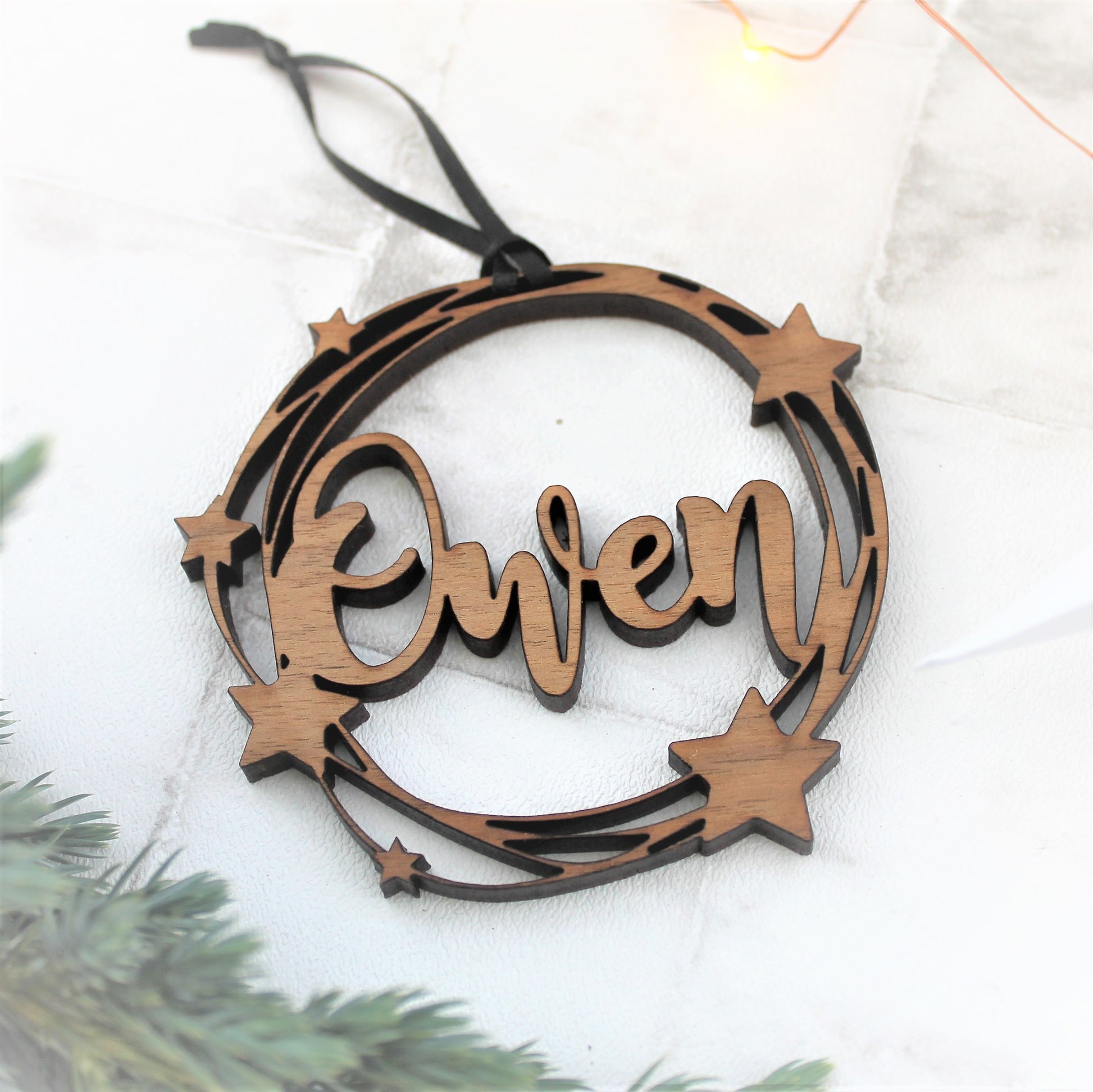 personalised name bauble made from wood with a cut out star design